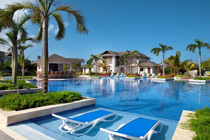 Sun loungers next to the pool