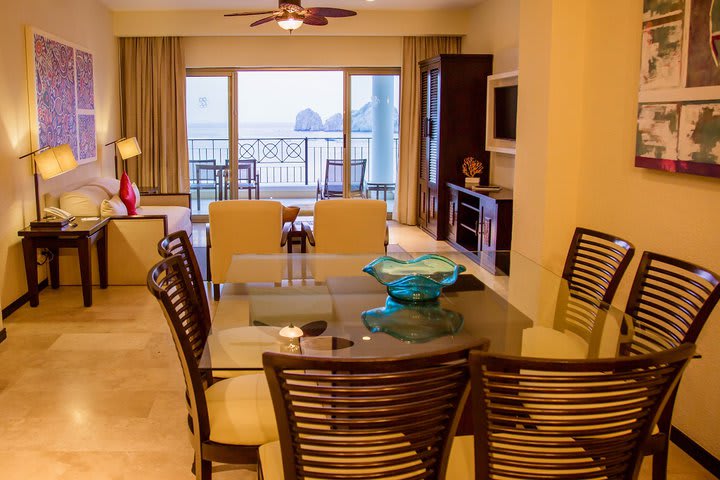 Dining and sitting areas in a suite with two bedrooms