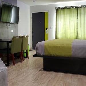 Exclusivo Inn & Suites