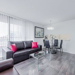 Spacious Furnished Apartment - Sleeps 4. With Walkout Balcony, Parking Available