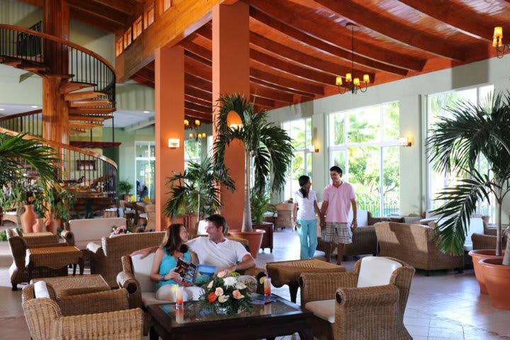 Caribbean-style hotel surrounded by gardens