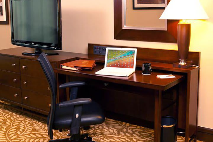 The rooms include a work desk