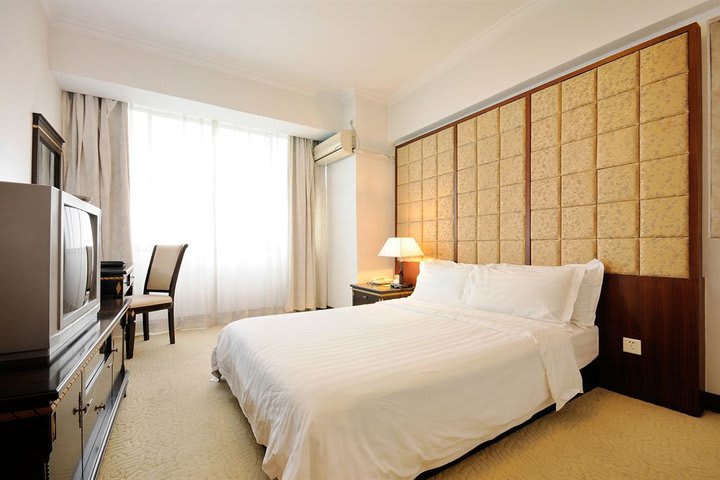 El hotel Rayfont Hotel & Apartment en Shanghái dispone de suites con camas king