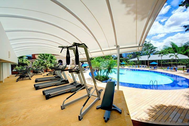 Fitness center in front of the pool