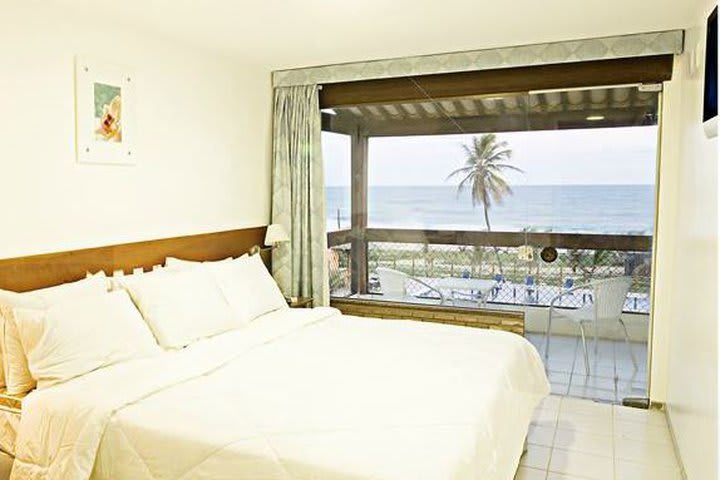 Guest rooms at the Villa da Praia hotel have a balcony with hammock