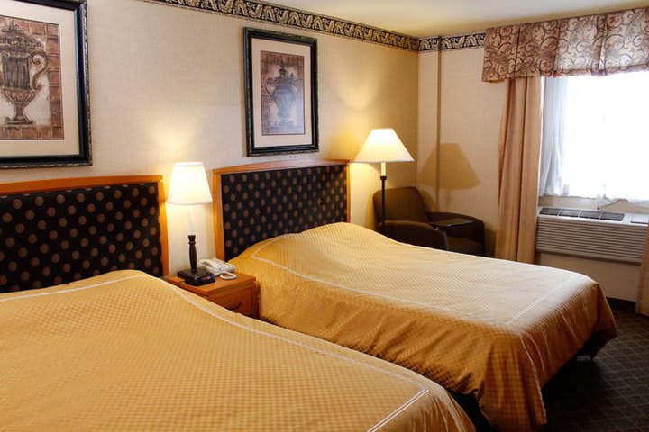 Guest room with two double beds at the Best Western Convention Center Hotel