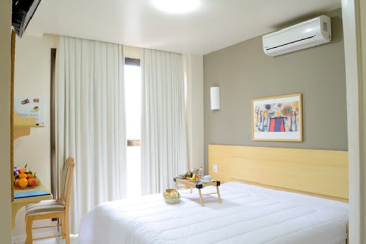 Guest rooms at Hotel Coral Tower Express offer air conditioning