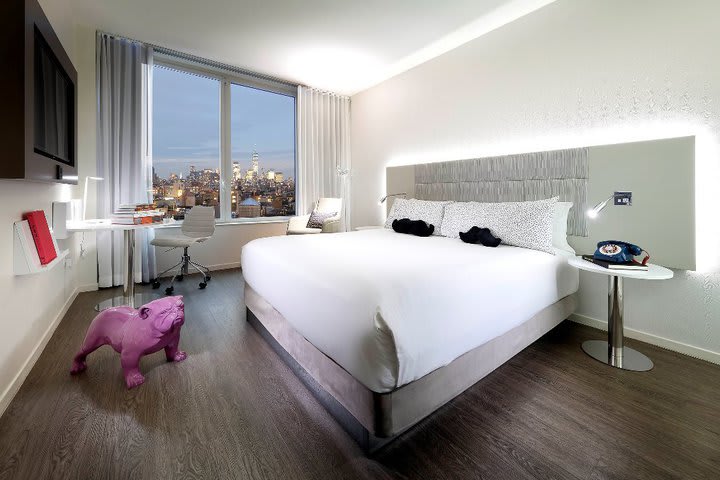 Inside king guest room with city view