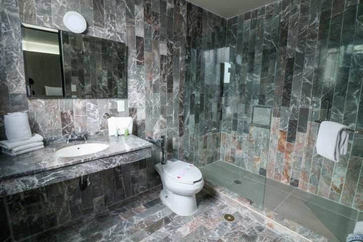 Private bathroom with shower in a superior guest room