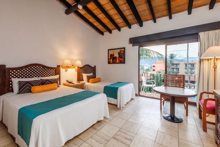 The hotel offers 155 guest rooms decorated in Mexican style