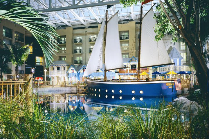 Enjoy a meal at the Sunset Sam's Fish Camp restaurant on board a sailboat at the Gaylord Palms Resort & Convention Center