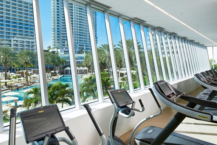 Fitness center with pool view