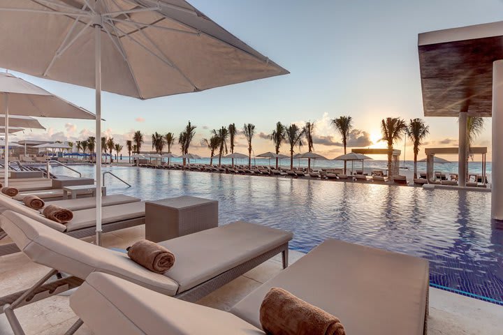 Sun loungers next to the pool