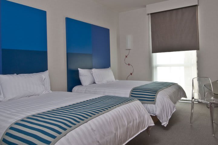 Guest rooms are fitted with alarm clock radio