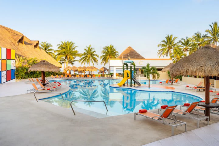 Sun loungers next to the pool