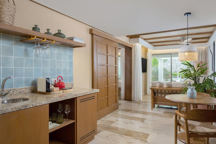 Kitchen and dinning area in a room