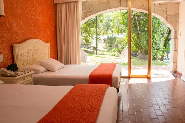 Some rooms at Hotel Villa del Conquistador offer views to the garden