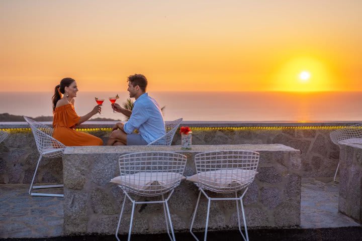 Enjoy a drink in the Sunset Bar