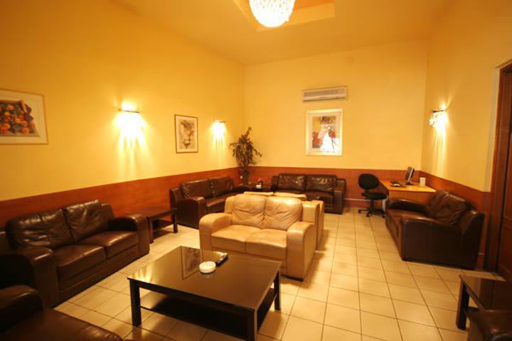 Relax in the sitting area at the Aristoteles Hotel