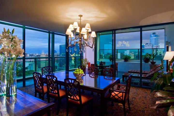 Dining area and balcony in a penthouse suite