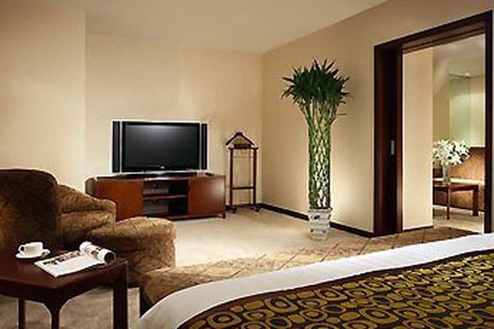 Guest rooms at the Mercure Wanshang Beijing hotel have an LCD TV