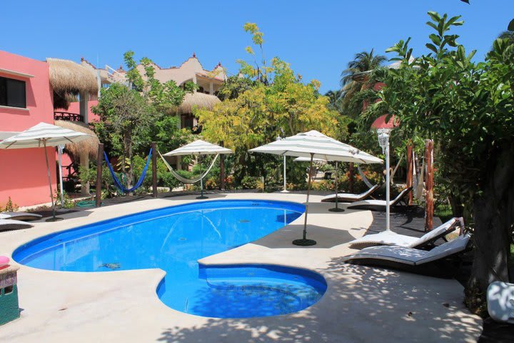 Outdoor pool at Cabañas María del Mar hotel on Isla Mujeres