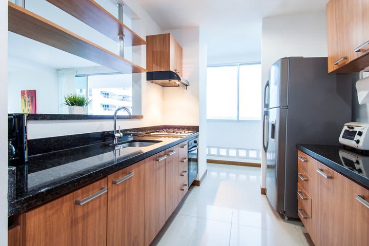 Kitchens with microwave and refrigerator