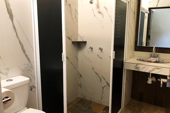 Private bathroom in a single guest room