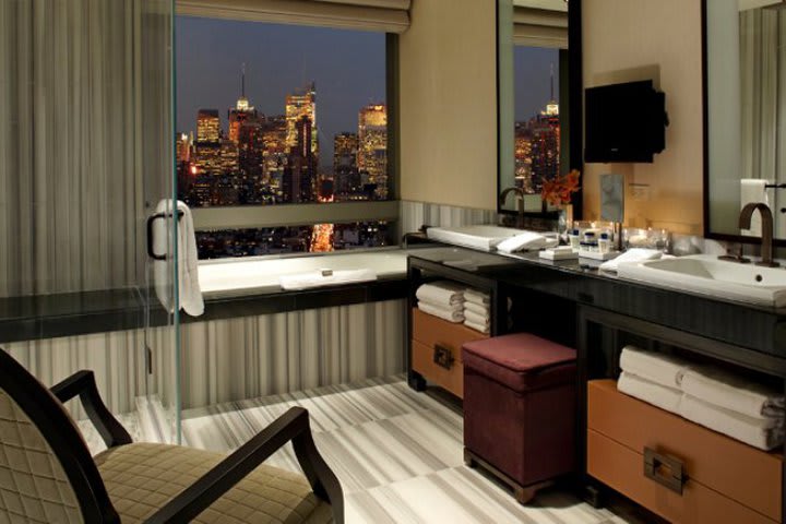 Guest rooms at the Trump SoHo New York hotel have a TV in the bathroom