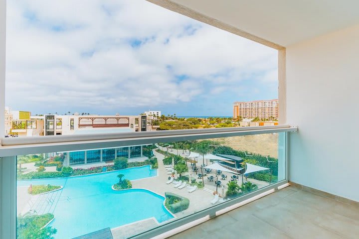 Balcony of a suite with two bedrooms and pool view