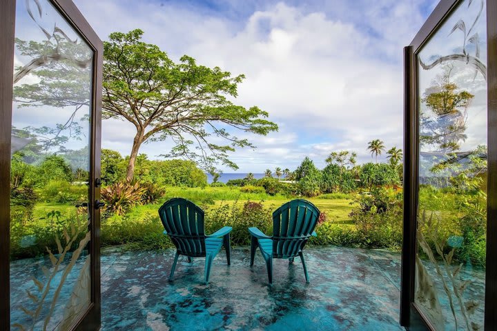 Habitación, varias camas, vistas al mar, en la zona del jardín