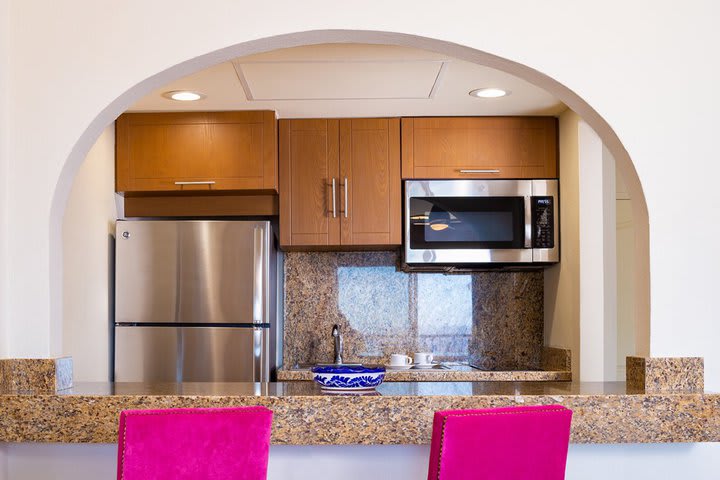 Kitchen in a suite with one bedroom