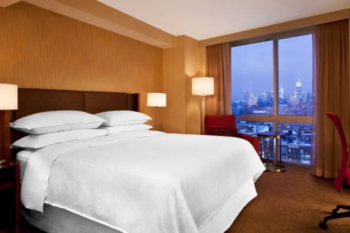 Guest room with king size bed at the Sheraton Tribeca New York Hotel