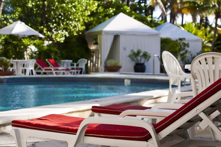 Sun loungers by the pool at the Richmond Hotel