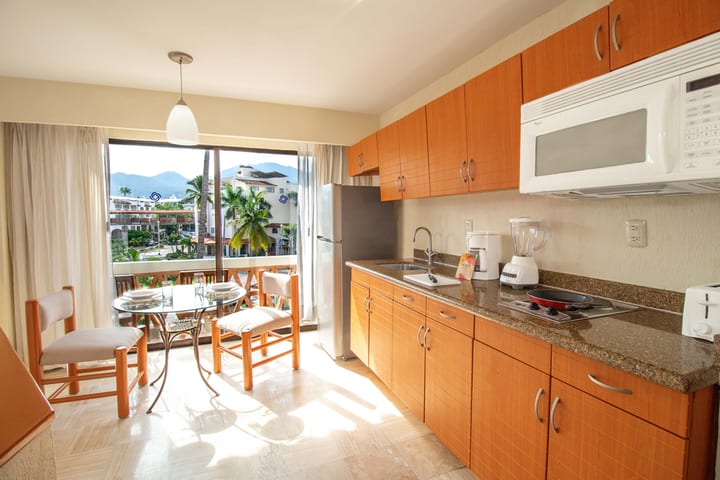 Dining area of a studio with kitchenette