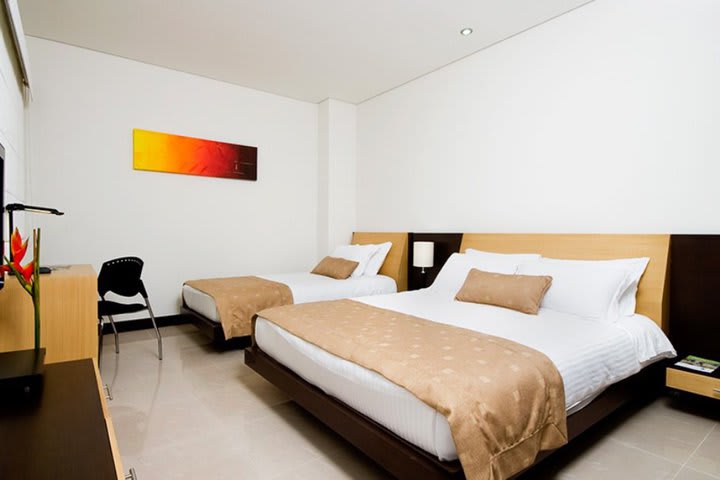 Guest room with two beds at Lincoln, hotel in Medellin, Colombia