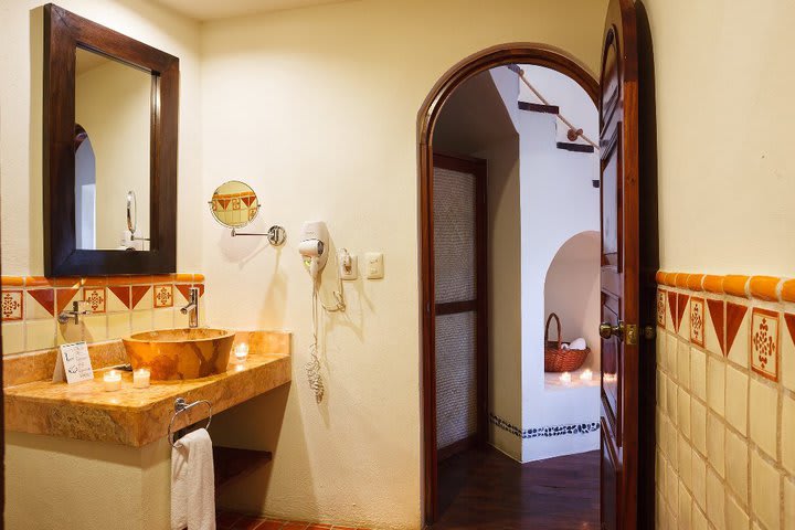 Private guest bathroom with a hairdryer