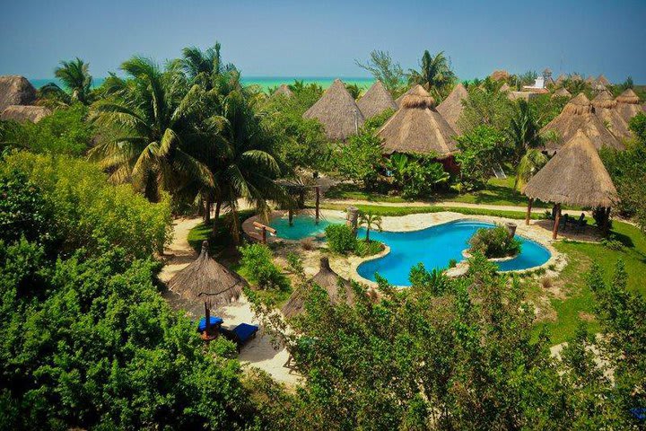 Area de alberca en Villas Delfines en Isla Holbox