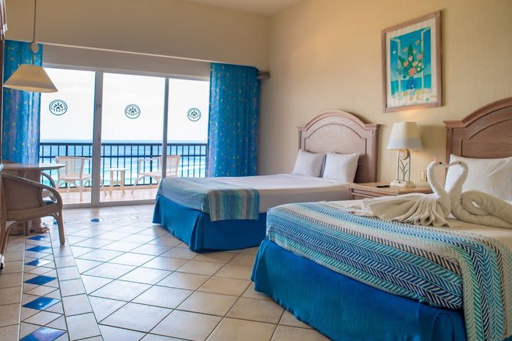 Guest room with ocean view and private balcony