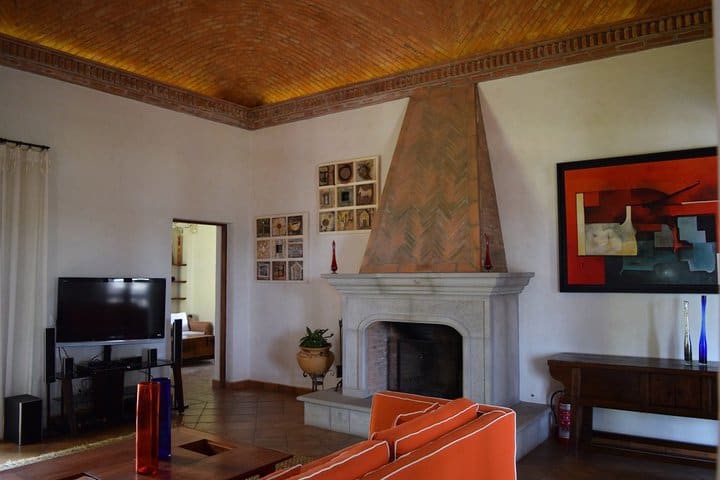 Sitting area with a fireplace in a suite