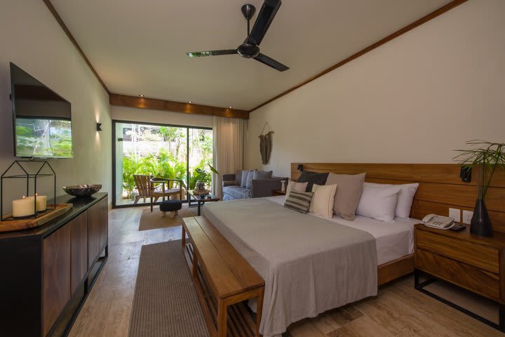 Guest room overlooking the garden and the pool