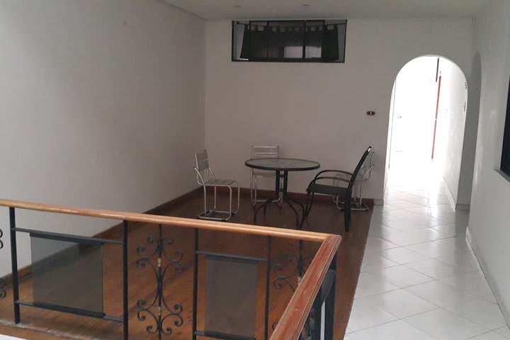 Table and chairs inside the hotel