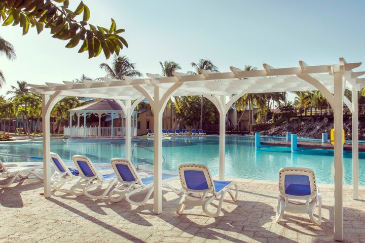 Sun loungers next to the pool