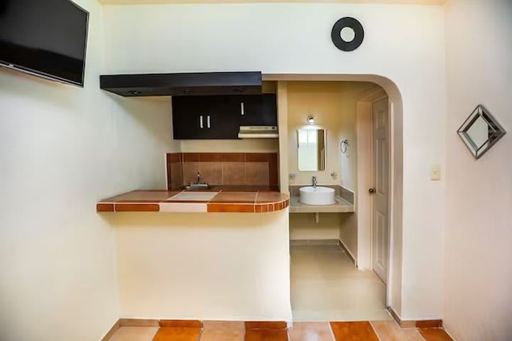 Kitchenette and bathroom in a suite