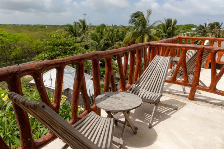 Balcony in a room with sunset view