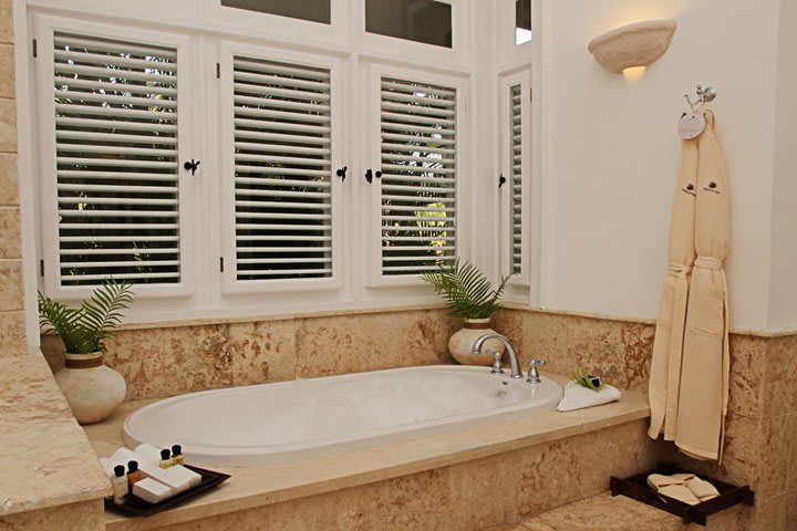 Suites offer a private bathroom with tub