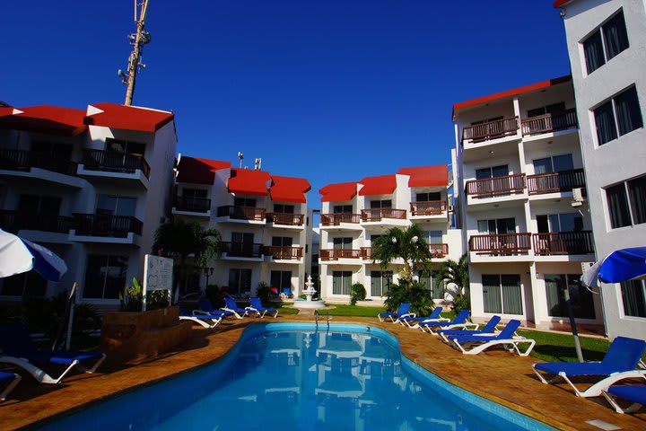 Sun loungers around the pool at the Imperial Las Perlas hotel