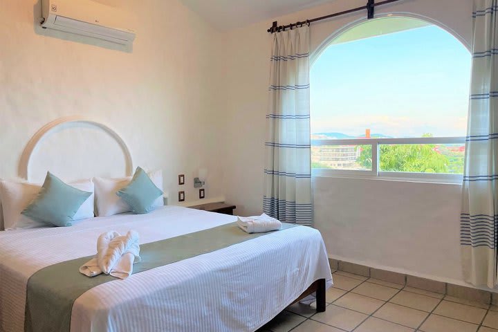 Bedroom in the apartment with garden view