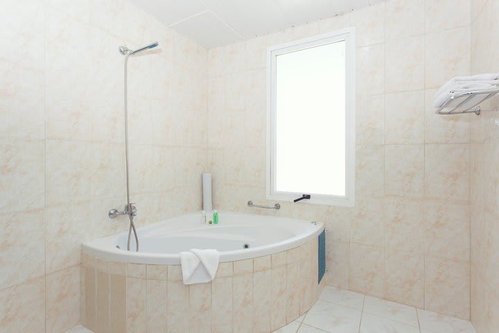 Bathroom with jacuzzi in a suite