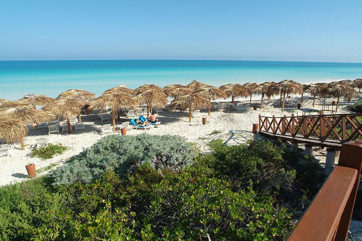 View of the beach from a terrace at the property